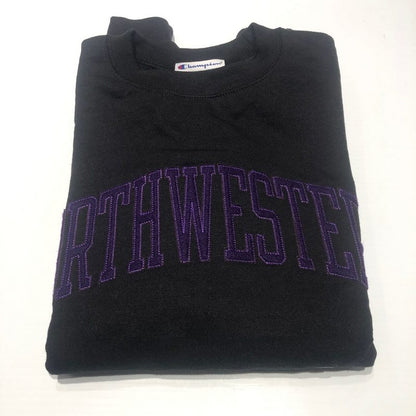Northwestern University Wildcats Men's Black Champion Eco Powerblend Crewneck Sweatshirt with Purple Arched Northwestern Wool Sewn Appliqué Design-2