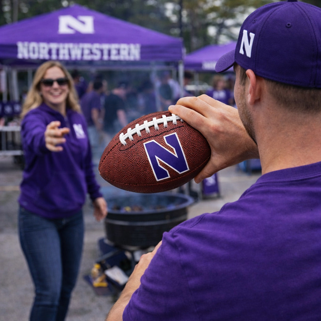 Northwestern Wildcats mini football being thrown at tailgate